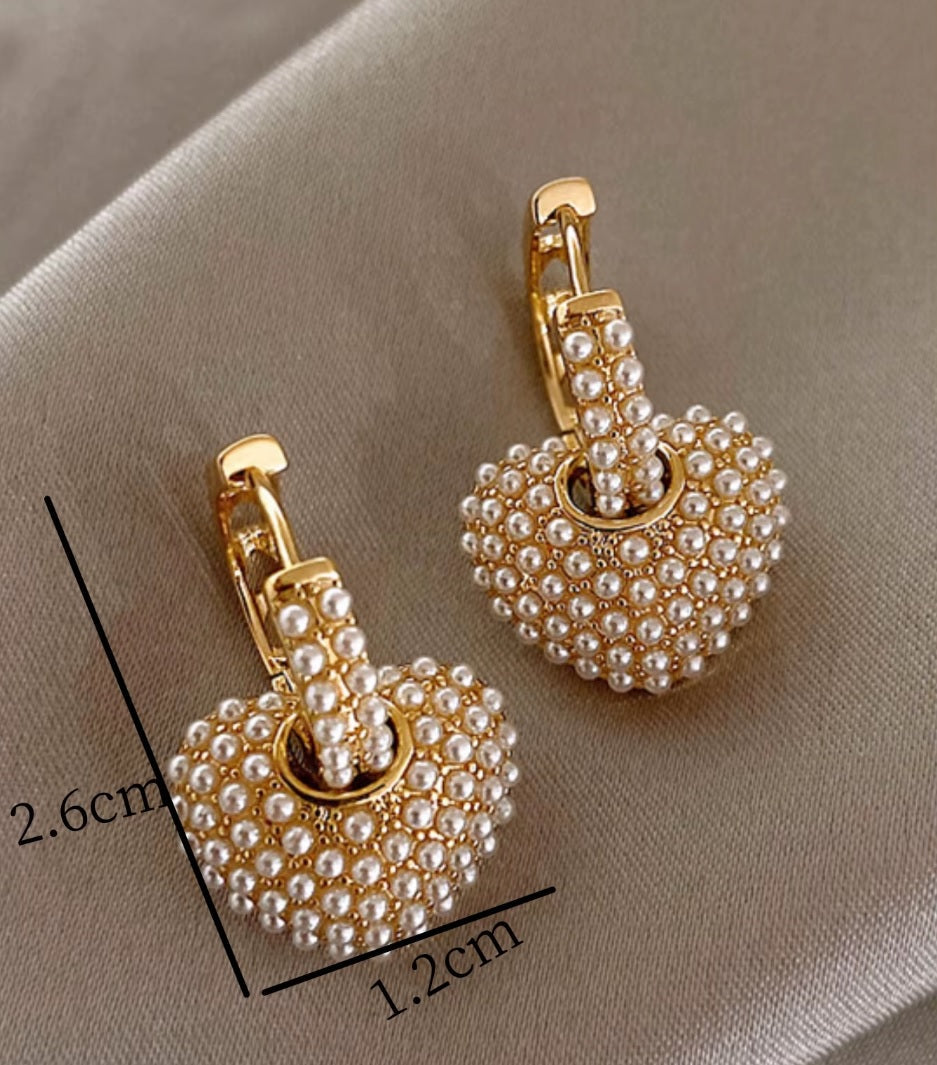 Boucles d'oreilles en forme de cœur en perles