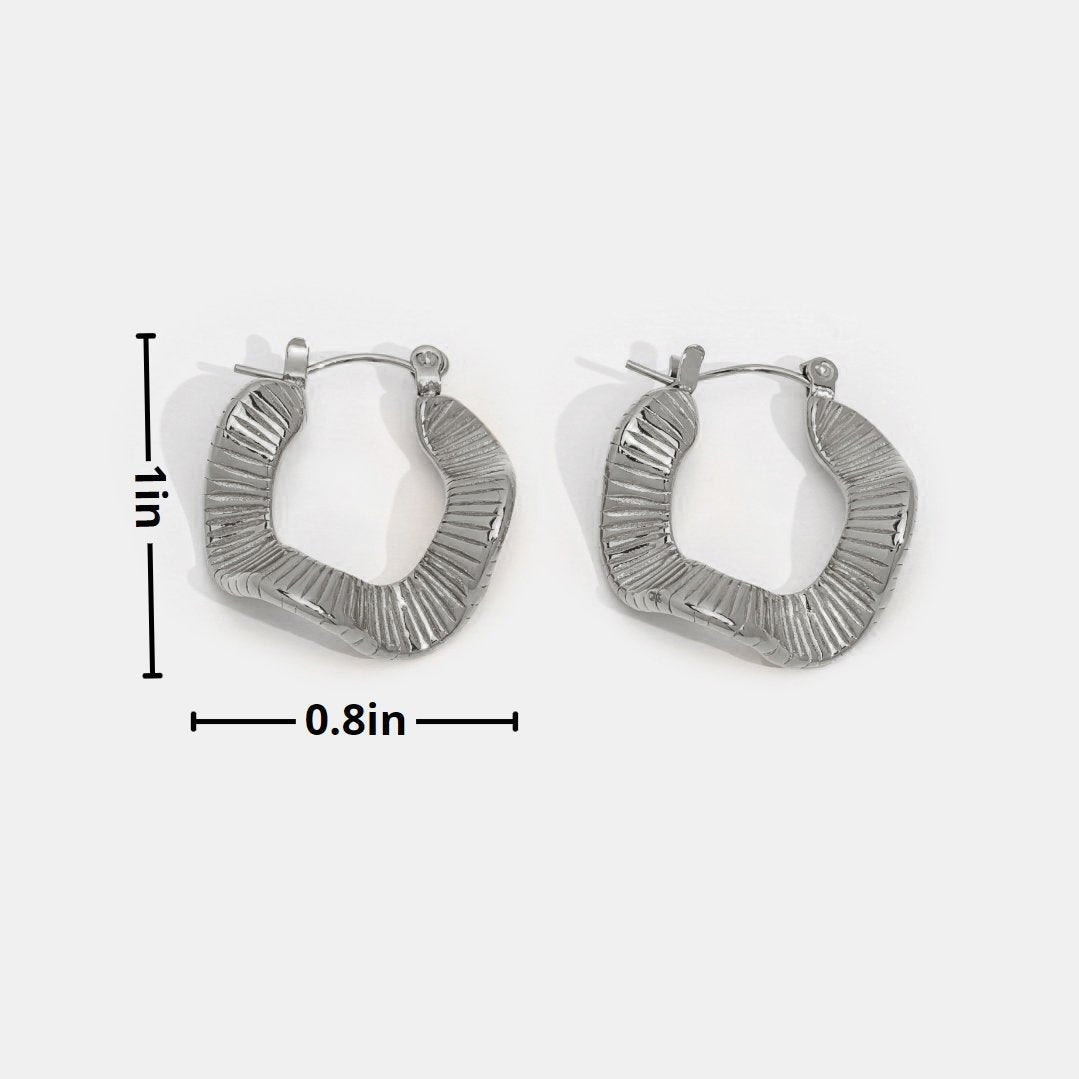 Boucles d'oreilles créoles en argent à motif géométrique