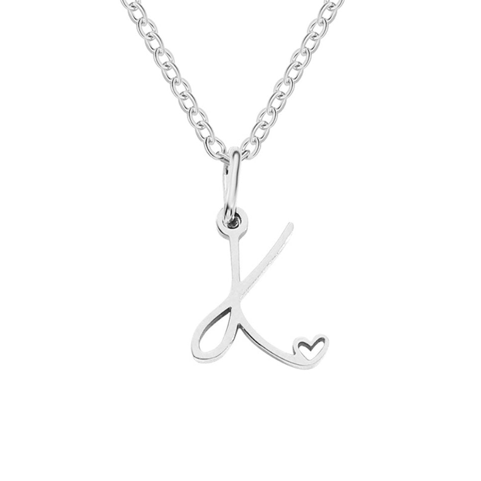 Collier en argent en forme de cœur avec initiale