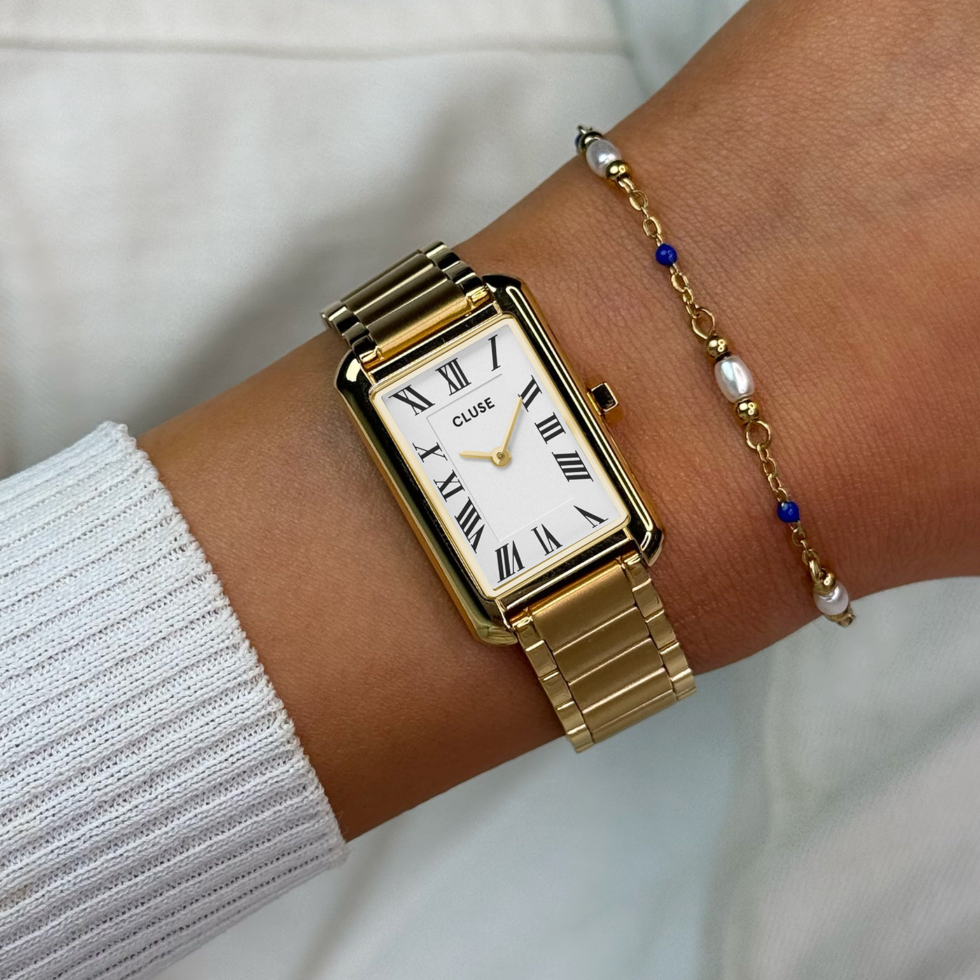 Montre Belisenna en acier, couleur blanche et dorée