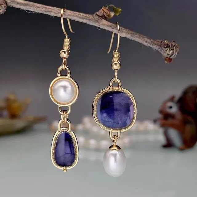 Boucles d'oreilles vintage en pierre bleue dorée