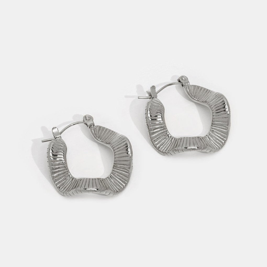 Boucles d'oreilles créoles en argent à motif géométrique