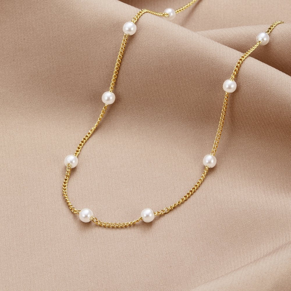 Collier en perles d'or pur