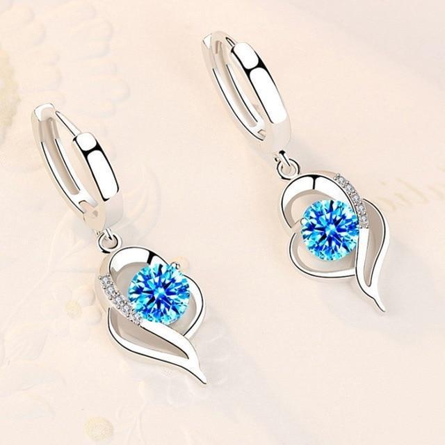 Boucles d'oreilles florales avec zirconia