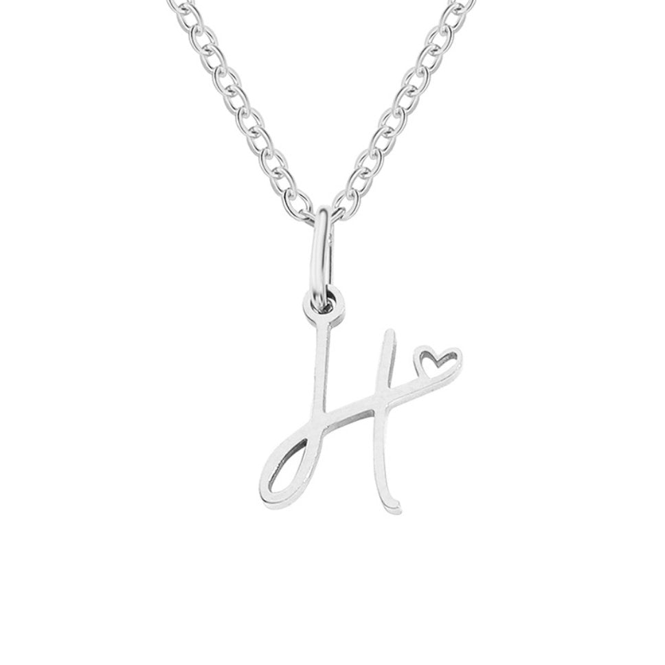 Collier en argent en forme de cœur avec initiale