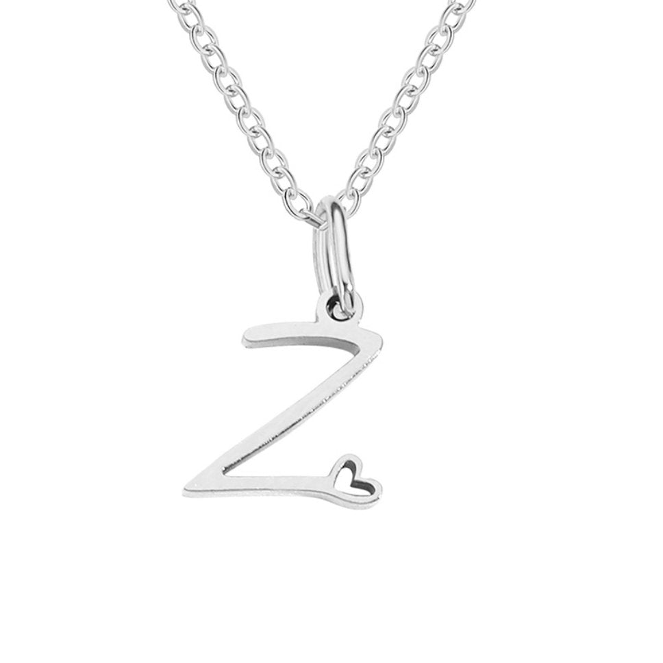 Collier en argent en forme de cœur avec initiale