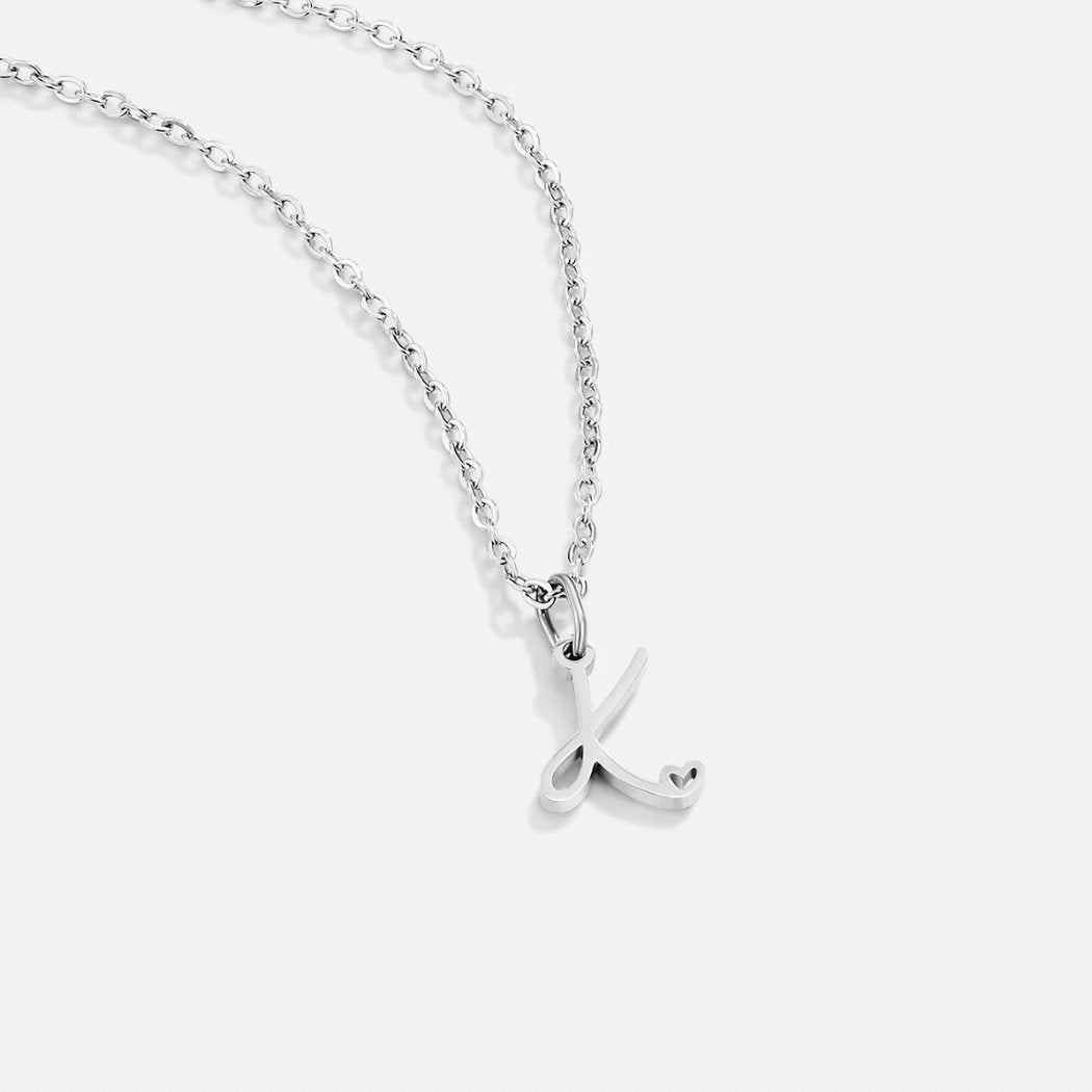 Collier en argent en forme de cœur avec initiale